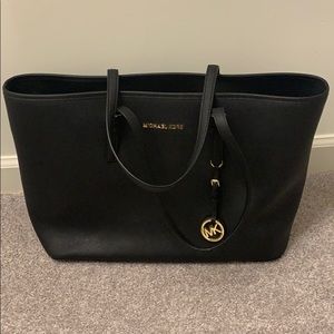 Michael Kora Jet Set Black leather tote